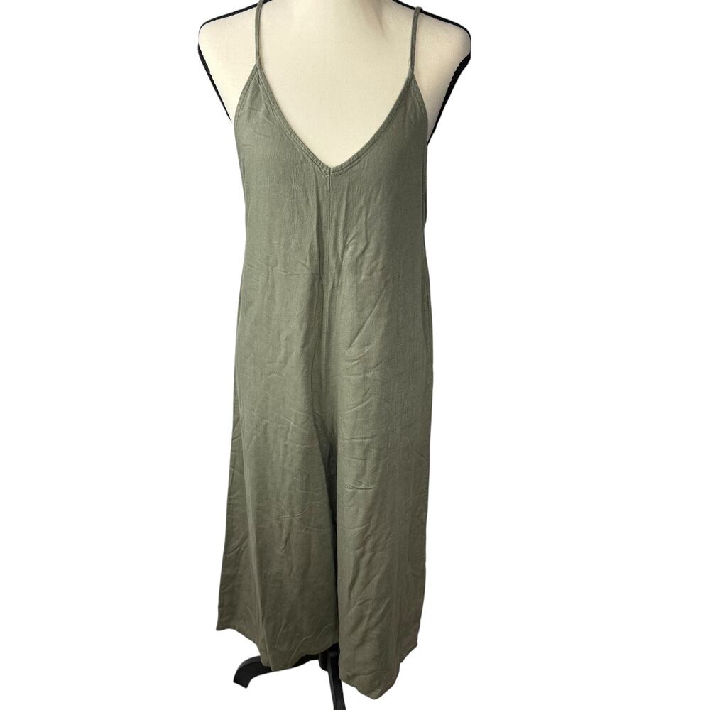 Olive Green linen jumpsuit with adjustable straps and side pockets